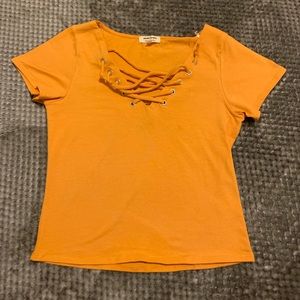 Laced Yellow/ Orangish Shirt.